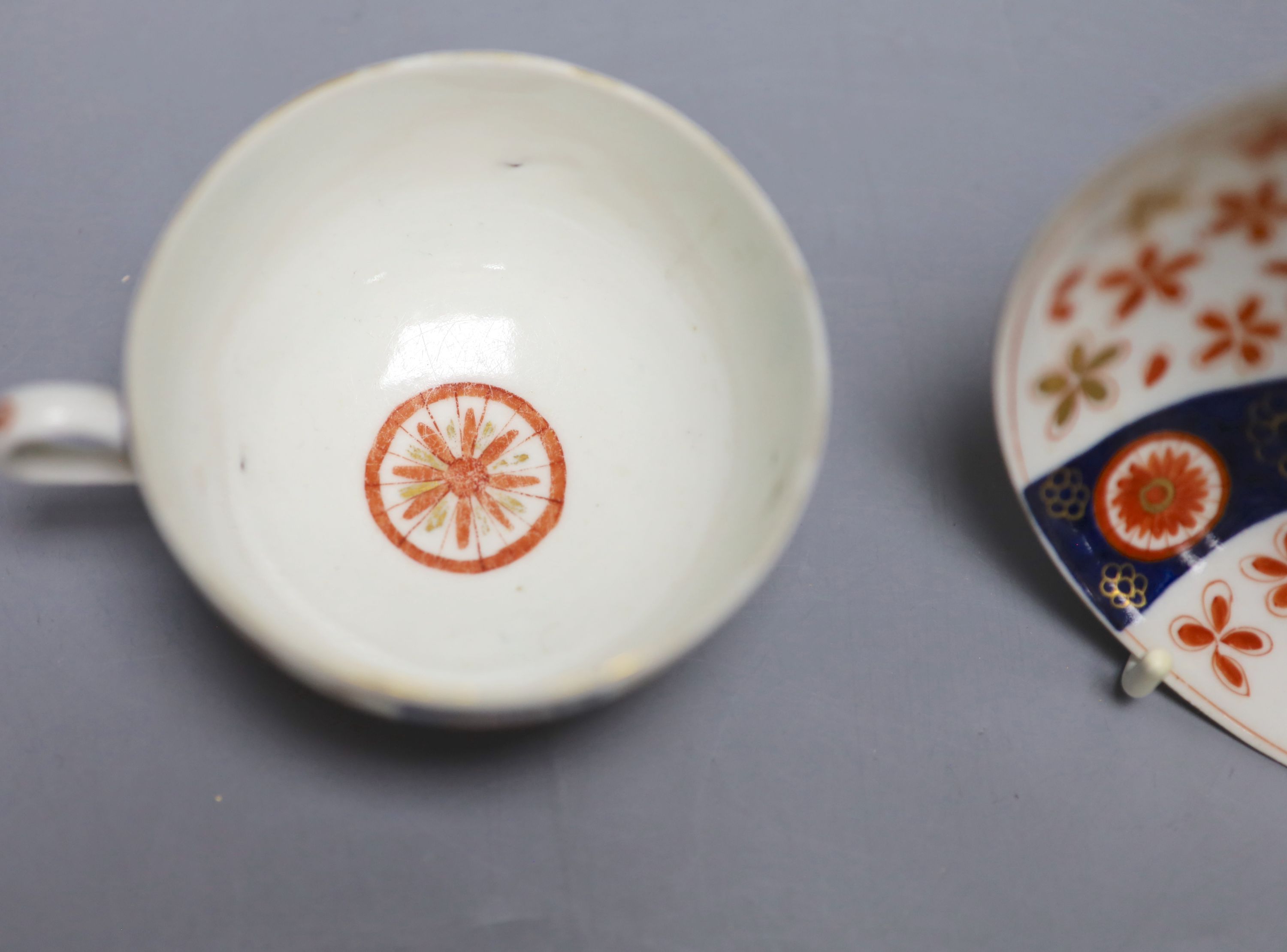 An 18th century Worcester cup and saucer painted with the Old Japan Star pattern, diameter 13cm